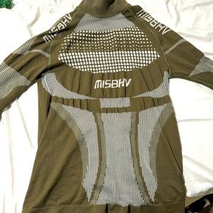 MISBHV SPORT turtle neck compression shirt, it’s brown and white.